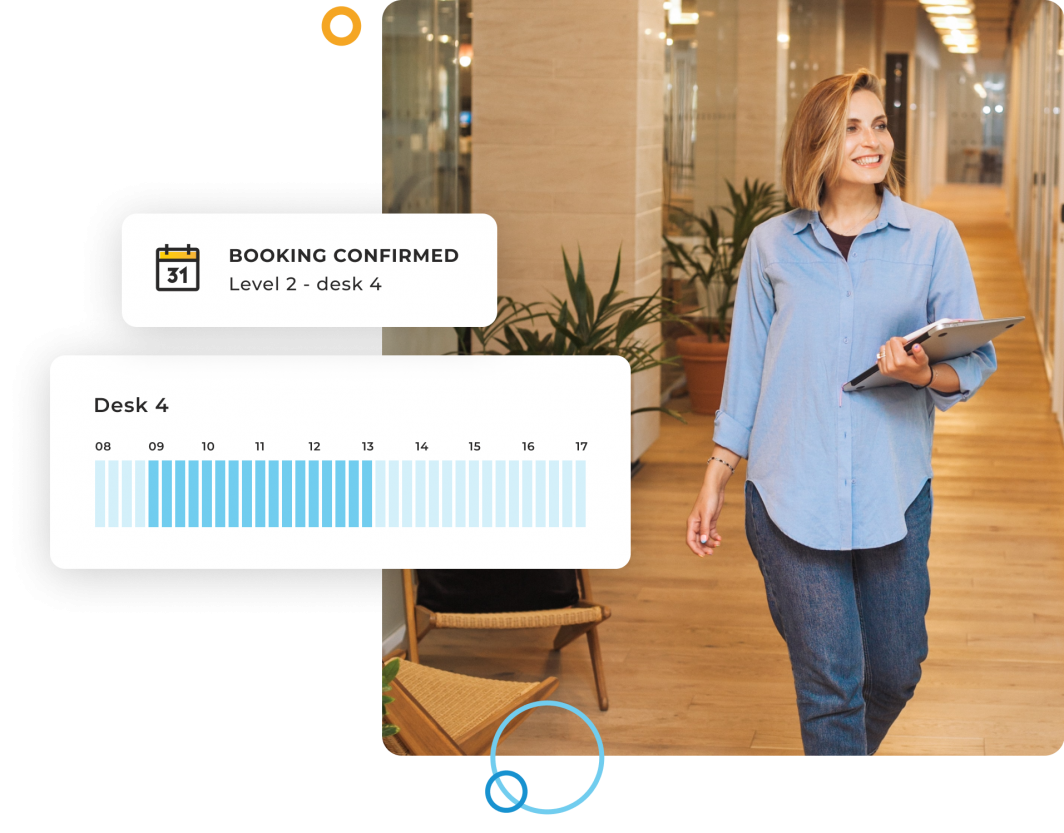 Woman walking through workspace with booking UI